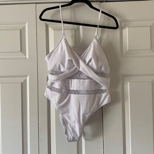 This‎ is ladies swimming suit with pads in the bust area .This suit is new .